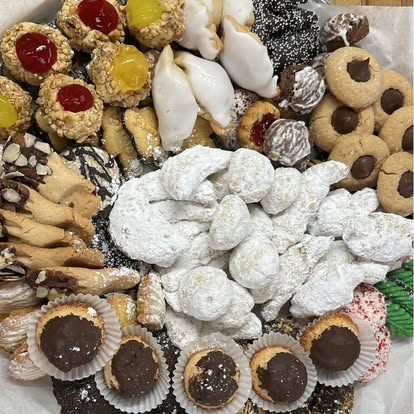 Italian cookie tray with thumbprints, powdered wedding cookies and chocolate