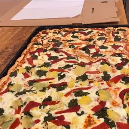 White sheet pizza with vegetables