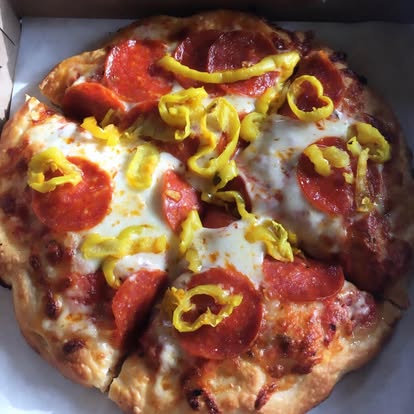 Pepperoni and banana pepper pizza fresh from the oven